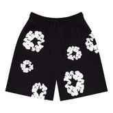 Denim Tears black floral print mesh shorts